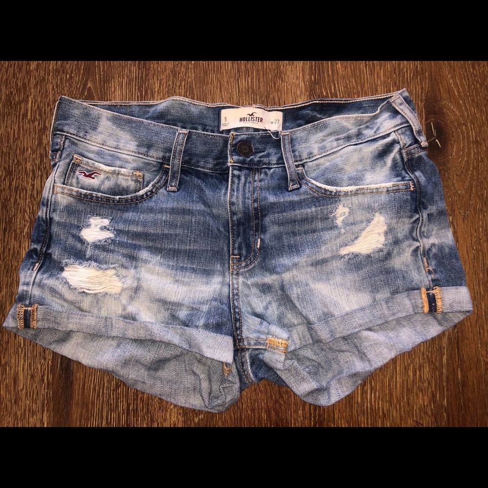 Ripped, faded jean shorts